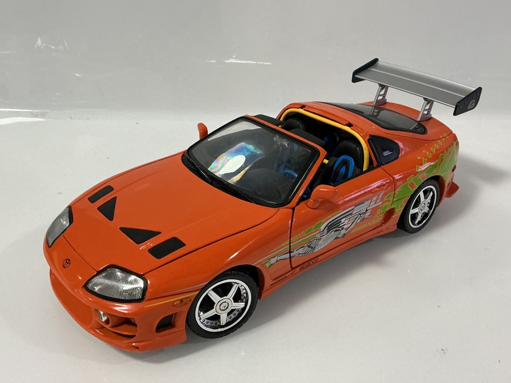 1/18 RACING CHAMPIONS 1995 TOYOTA SUPRA ORANGE ON BLACK/BLUE
