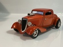 1/18 ERTL 1934 FORD STREET ROD ORANGE ON GREY
